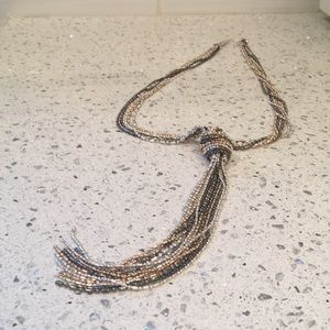 Grey, silver, gold toned knotted necklace